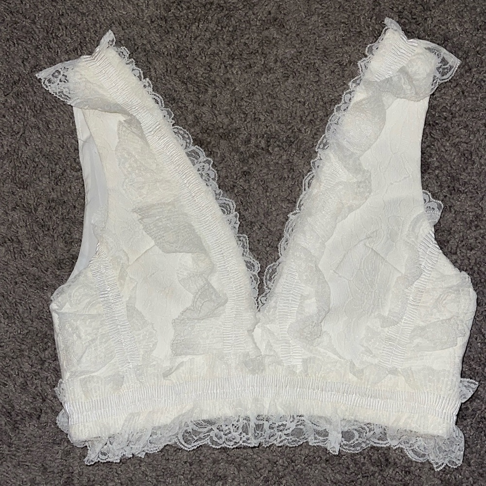 Cutest Lace Tank top size small. Never worn brand new with attached tag.